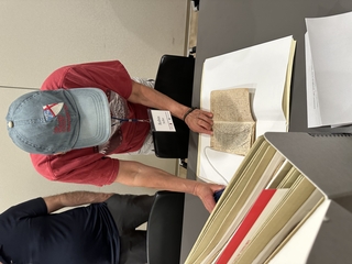 Fellow Robin Soller spending time with a Jonathan Edwards manuscript in Yale's Beinecke Rare Book and Manuscript Library