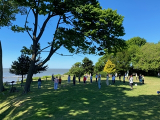 open air group by the sea